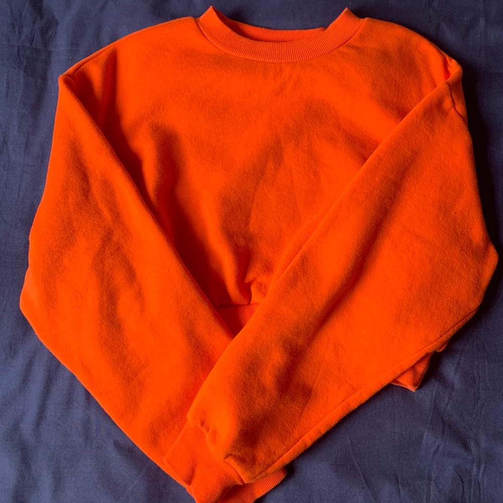 Bright orange crop top sweater